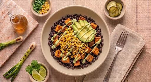 Black Bean & Sweet Potato Bowl — Black bean, roasted sweet potato, charred corn, avocado-lime.