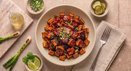 Gochujang Tofu & Sweet Potato — Gochujang tofu, roasted sweet potato, scallion, sesame.