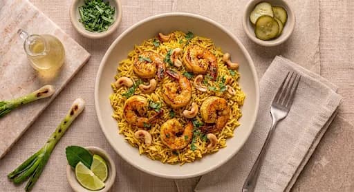 Shrimp Biryani — Spiced shrimp biryani, basmati, saffron, toasted cashew.
