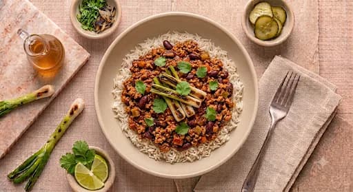 Turkey Chili & Brown Rice — Turkey chili, brown rice, lime, charred scallion.